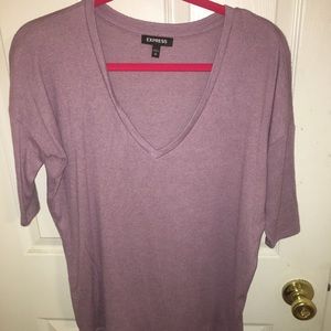 Purple V neck top. Sleeves fitted to elbow